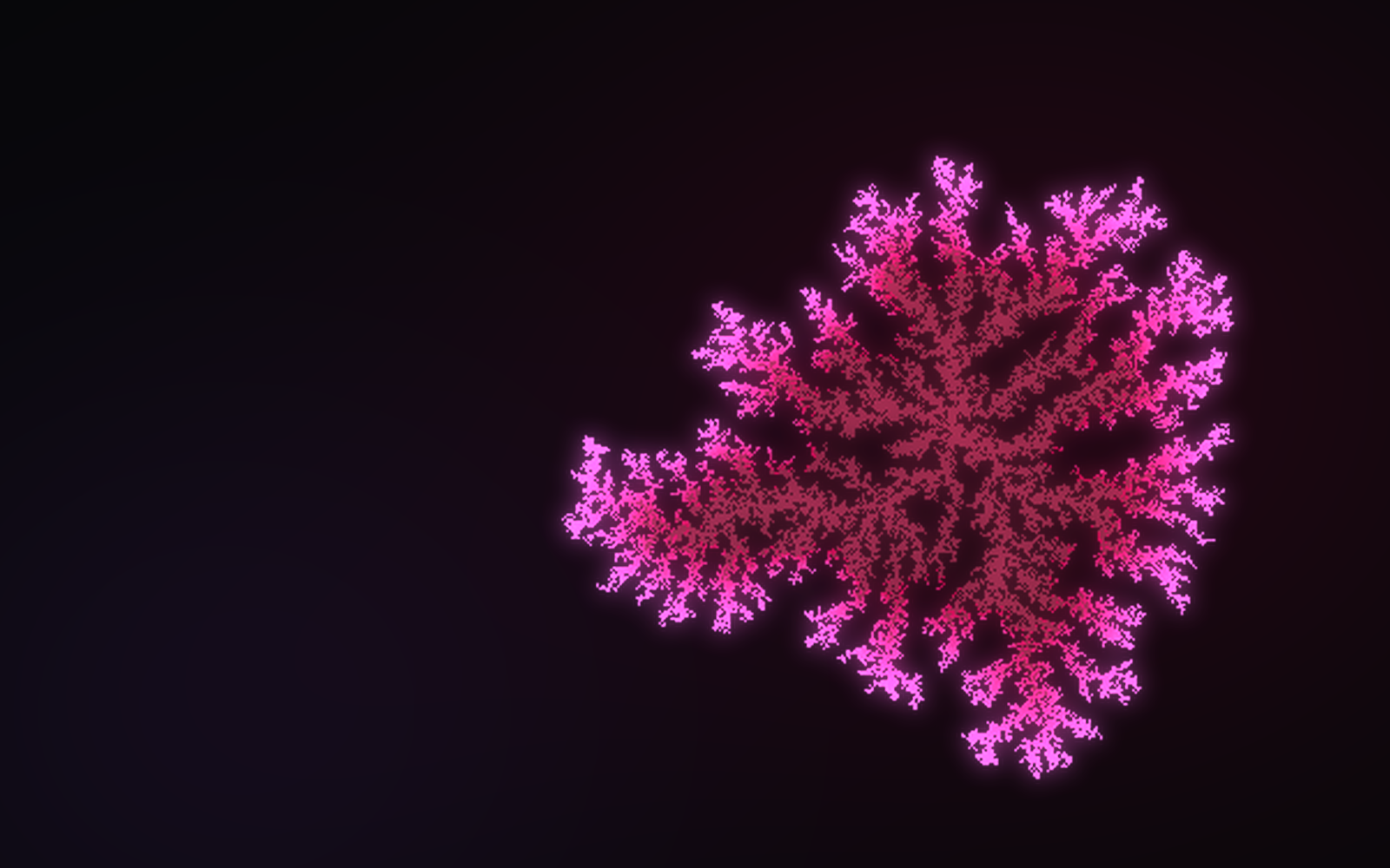 A branching fractal bacterial colony in crimson and violet